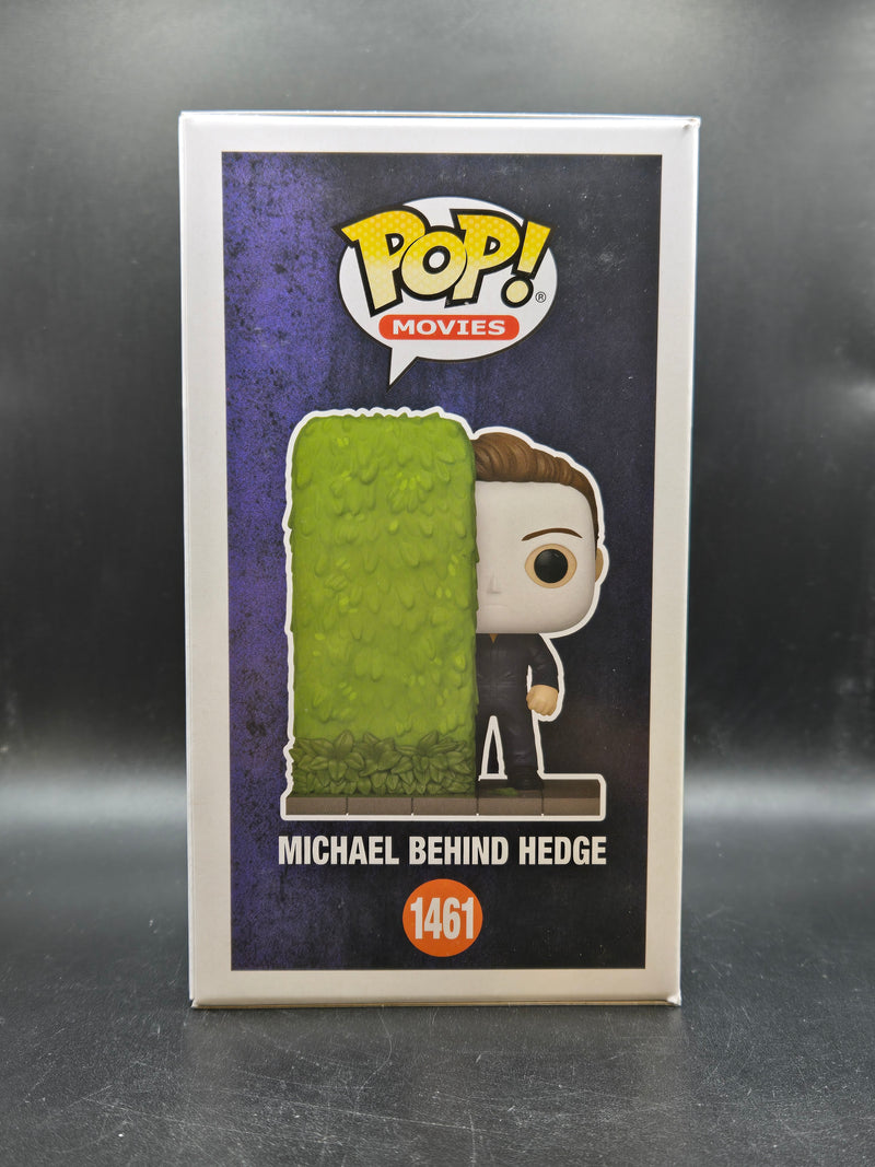 Michael Behind Hedge