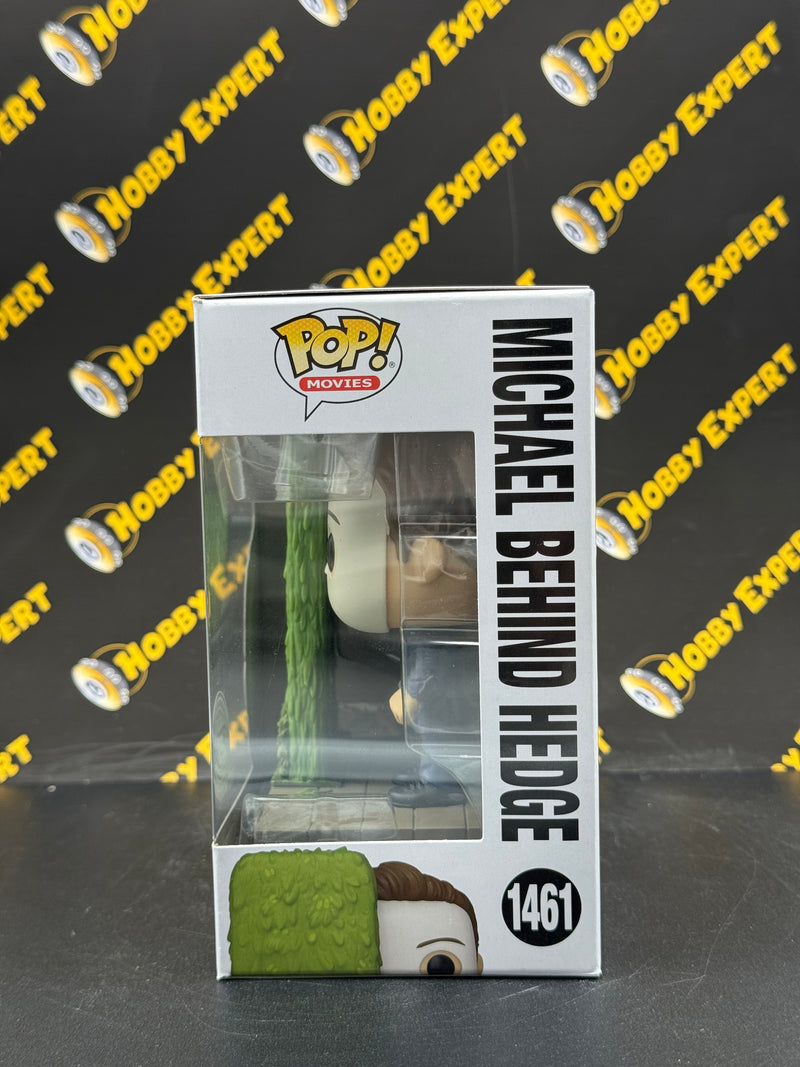 Michael Behind Hedge