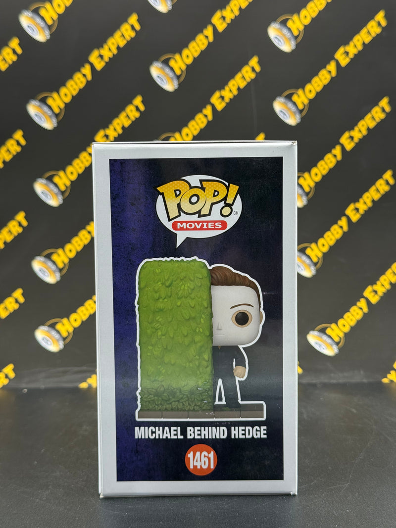 Michael Behind Hedge